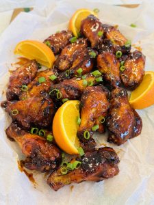 Aripioare glazurate cu miere și portocale