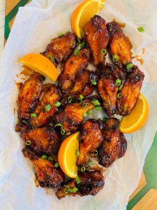 Aripioare glazurate cu miere și portocale