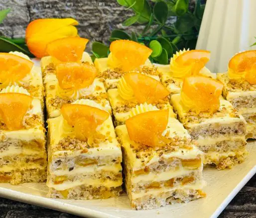 Prăjitura Bezea regală cu nucă portocale și cremă de ciocolată albă