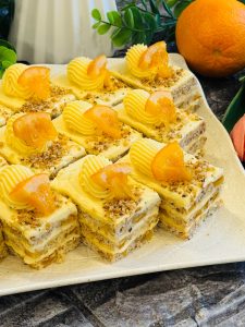 Prăjitura Bezea regală cu nucă portocale și cremă de ciocolată albă